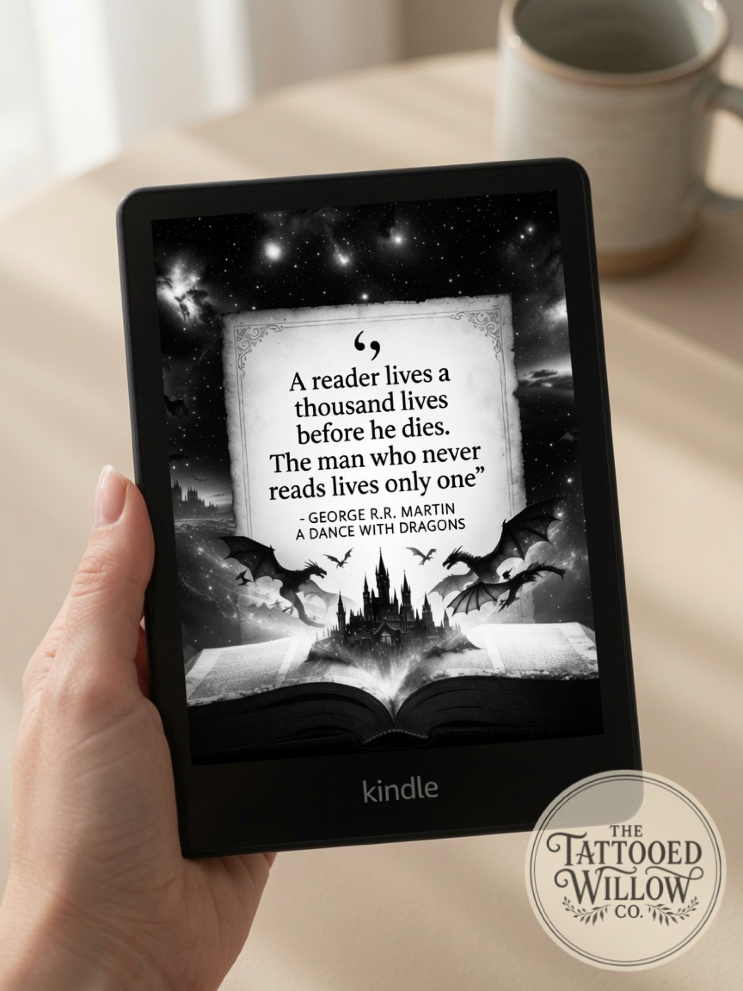 George R.R. Martin Quote held in hand